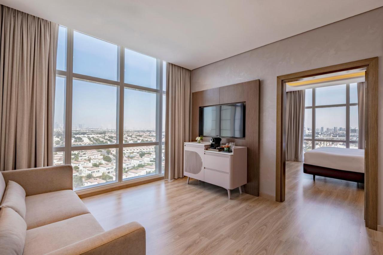 Movenpick Jumeirah Village Triangle Dubai Exterior foto Suite